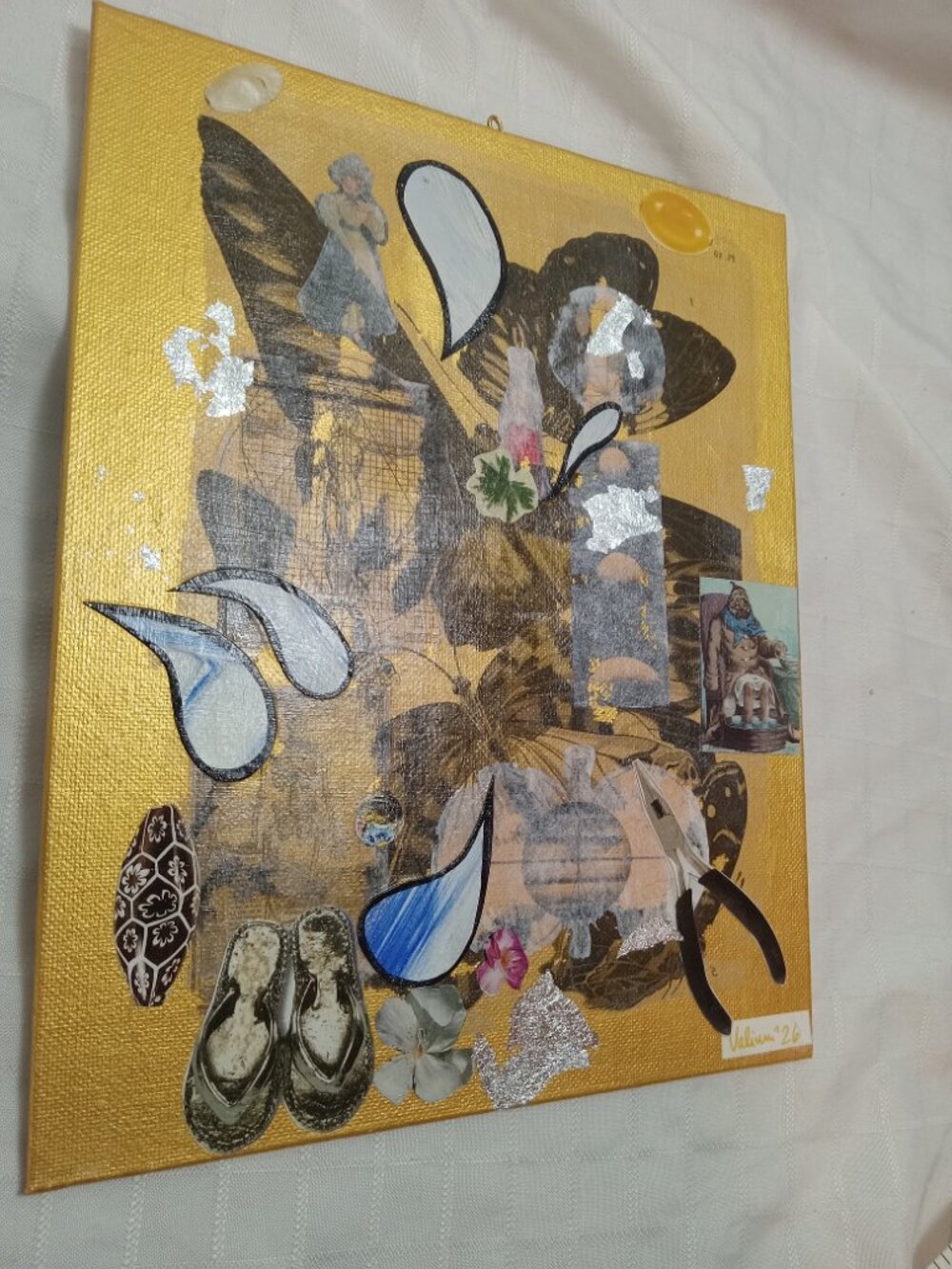 Prints of old magazines on canvas, gold paint, and mixed-media collages